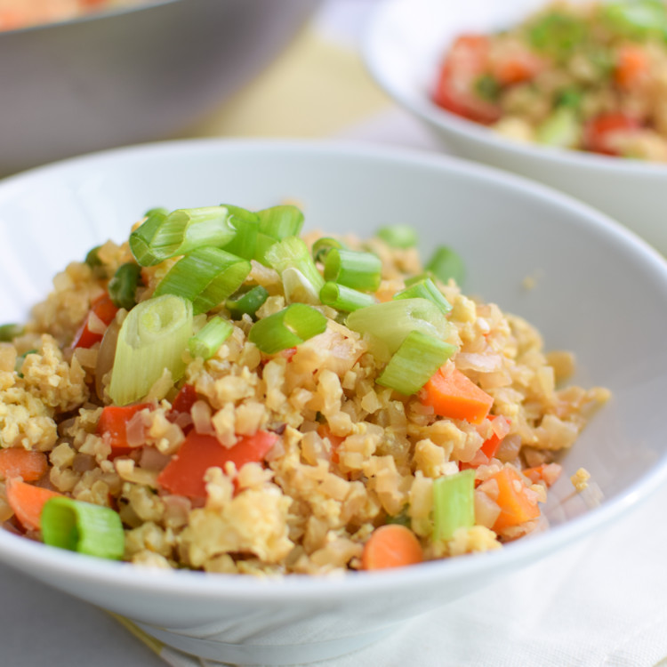 Fried Cauliflower Rice Recipe - Super healthy takeout style fried "rice", made with cauliflower! Packed with veggies and easy to personalize. - ProjectMealPlan.com