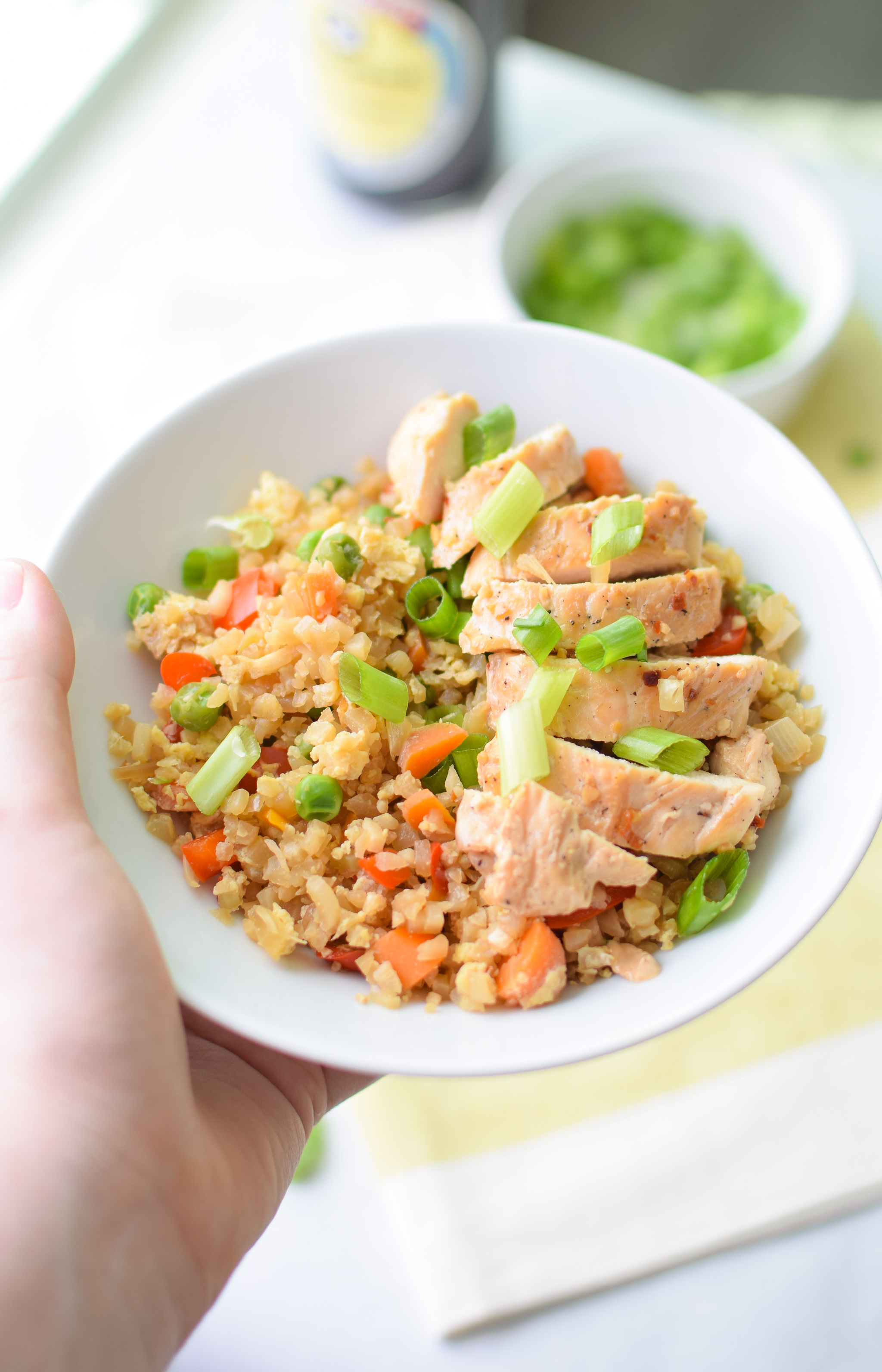 Fried Cauliflower Rice Recipe - Super healthy takeout style fried "rice", made with cauliflower! Packed with veggies and easy to personalize. - ProjectMealPlan.com