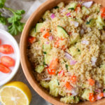 Make-Ahead Quinoa Party Salad - Easy recipe for a light Greek-inspired salad with cucumbers, peppers and onions. YUM. - ProjectMealPlan.com