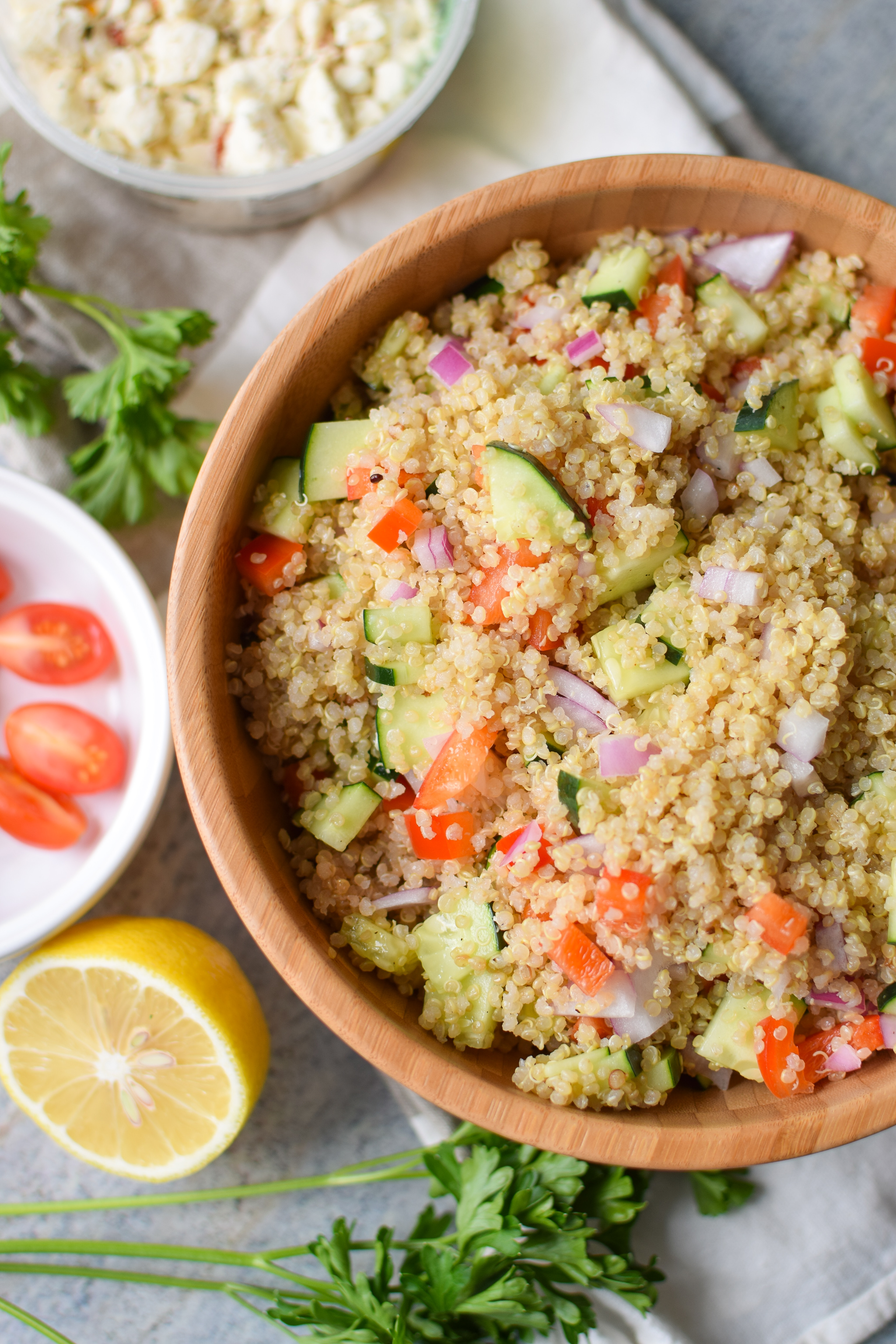 Make-Ahead Quinoa Party Salad - Easy recipe for a light Greek-inspired salad with cucumbers, peppers and onions. YUM. - ProjectMealPlan.com