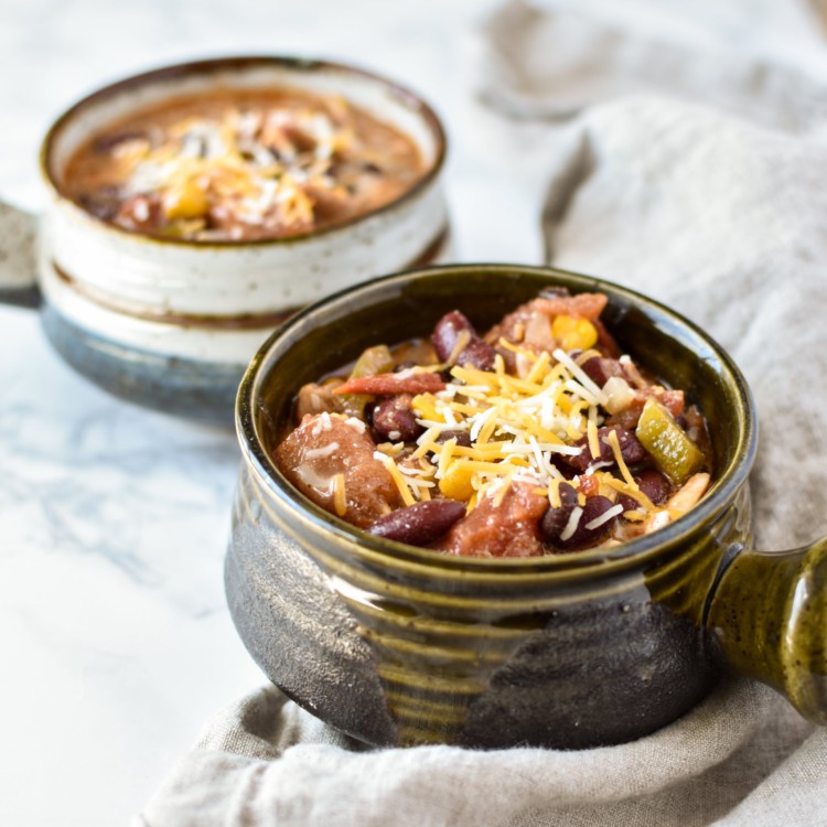 Easy Crockpot Chicken Thigh Taco Chili - Super easy crock pot taco chili to help clear out your pantry! Set it and forget it :) - ProjectMealPlan.com