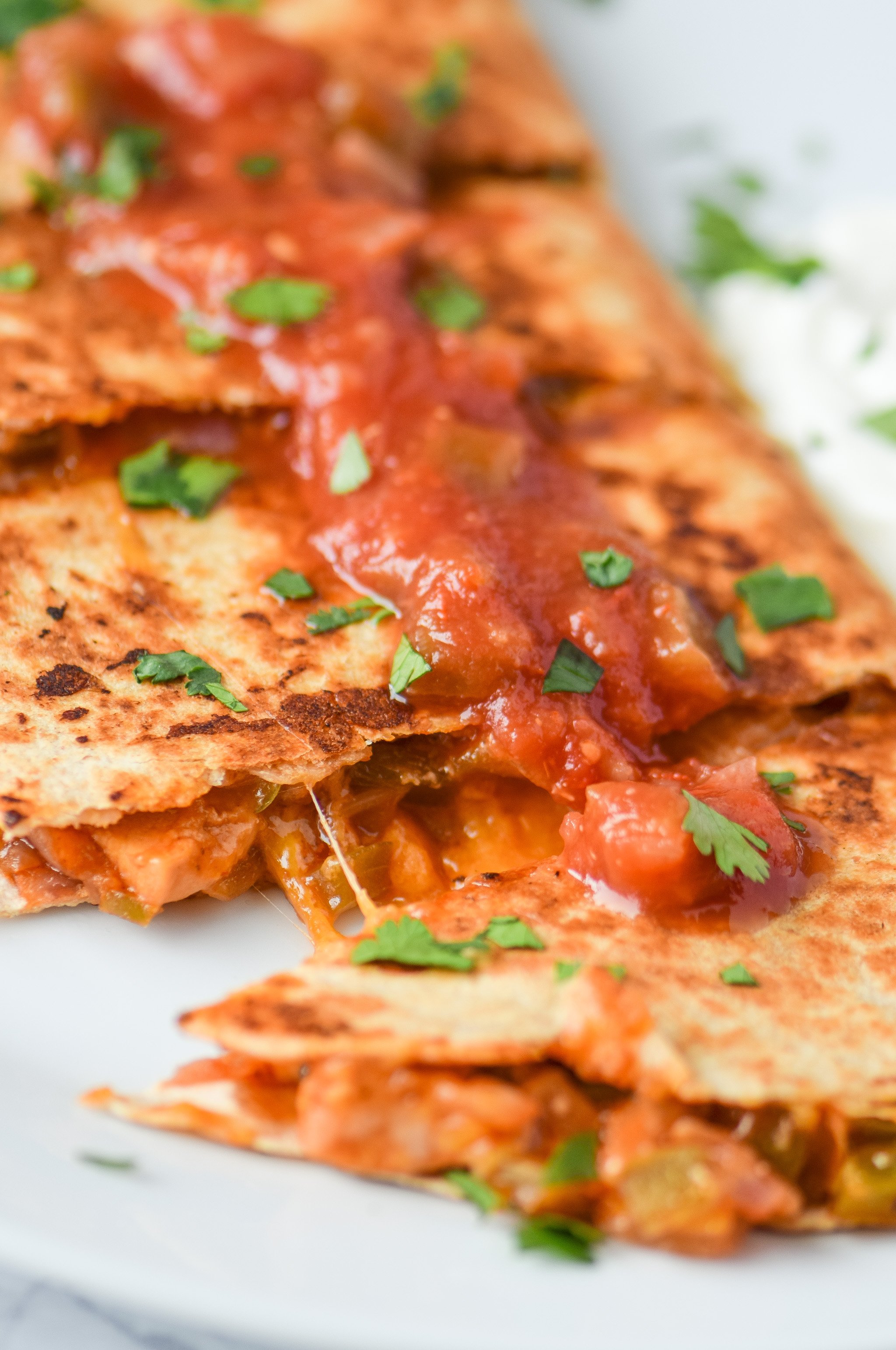 Quick BBQ Chicken Quesadillas (Make-Ahead Filling Recipe) - Delicious BBQ chicken quesadillas made in 10 minutes with pre-made filling! - ProjectMealPlan.com