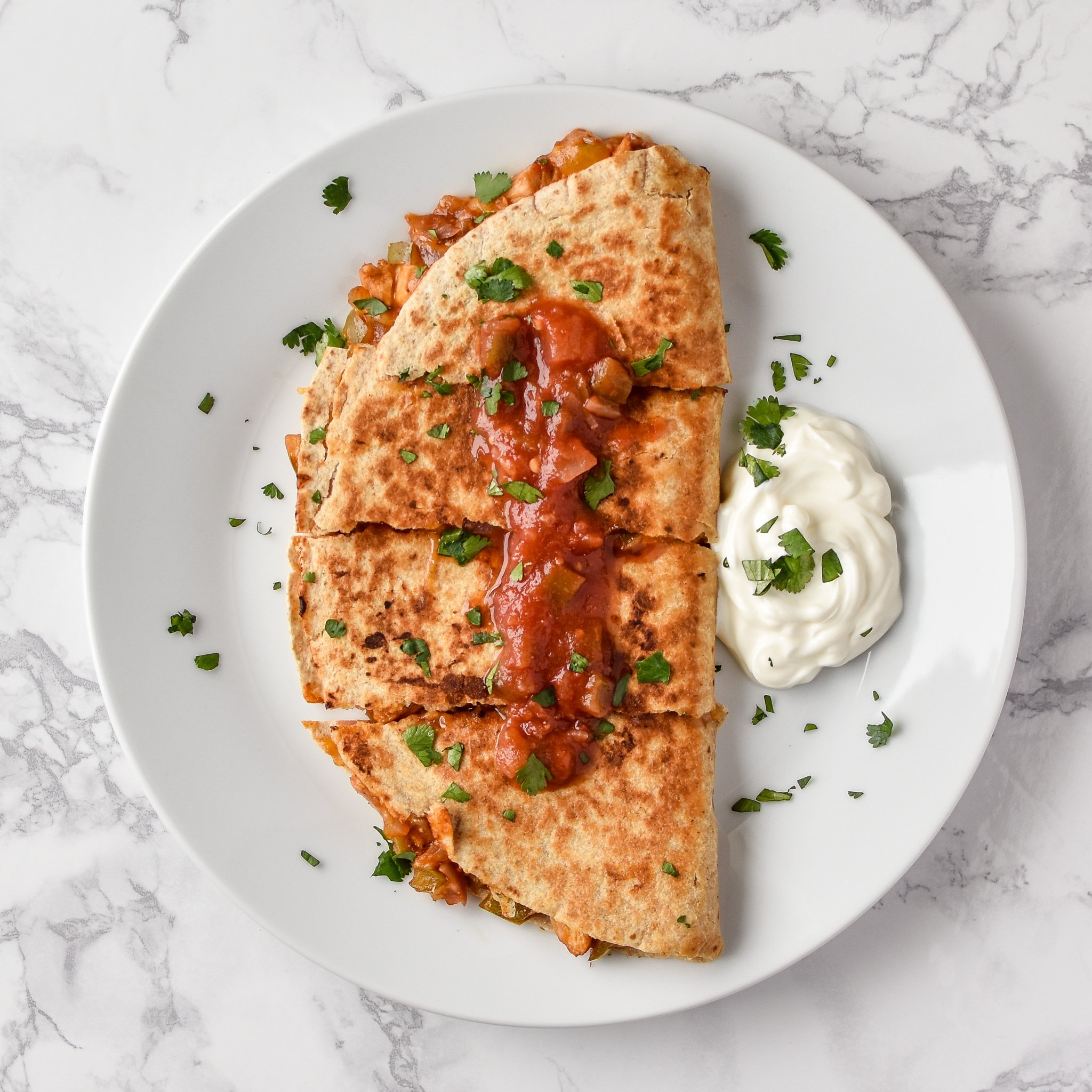 Quick BBQ Chicken Quesadillas (Make-Ahead Filling Recipe) - Delicious BBQ chicken quesadillas made in 10 minutes with pre-made filling! - ProjectMealPlan.com
