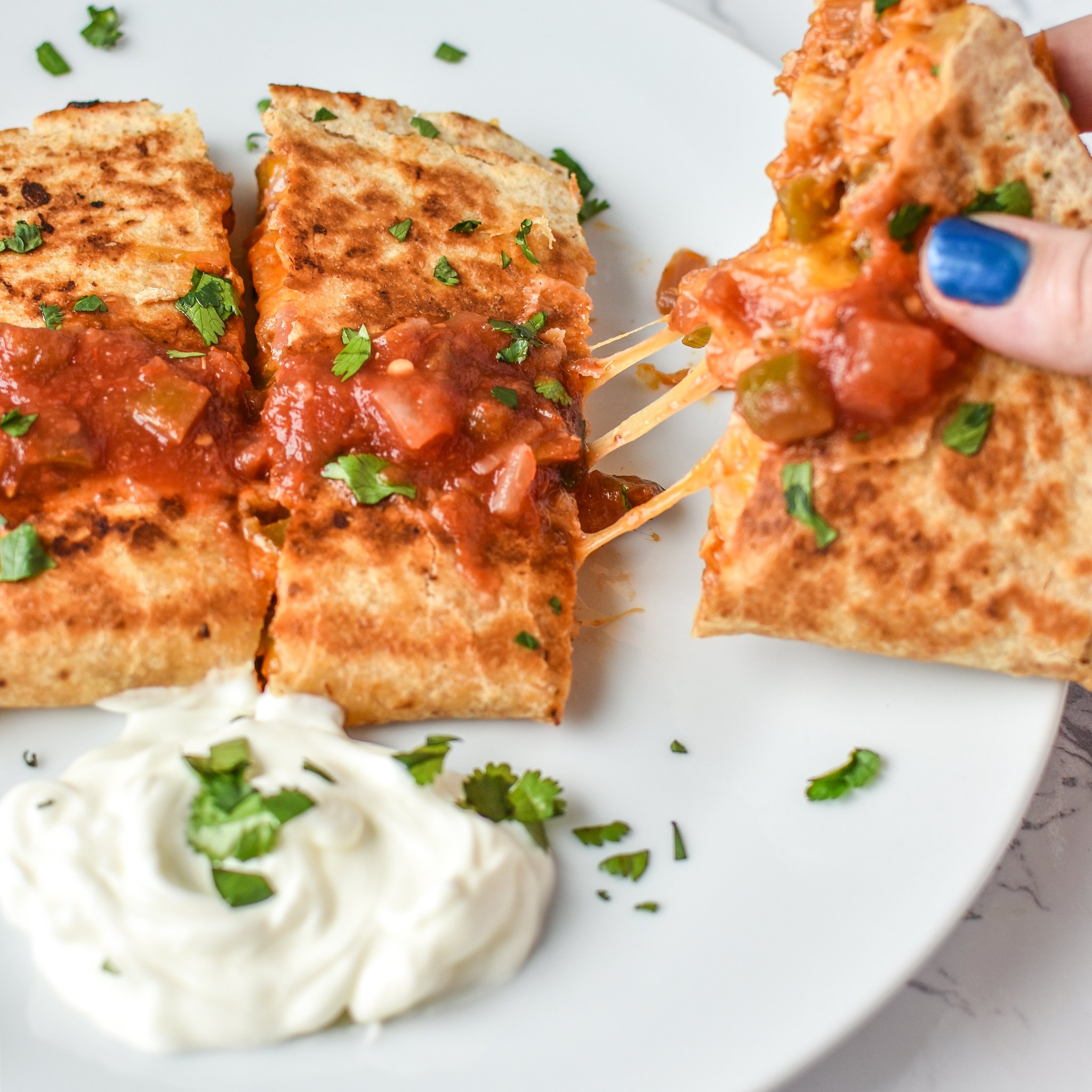 Quick BBQ Chicken Quesadillas (Make-Ahead Filling Recipe) - Delicious BBQ chicken quesadillas made in 10 minutes with pre-made filling! - ProjectMealPlan.com