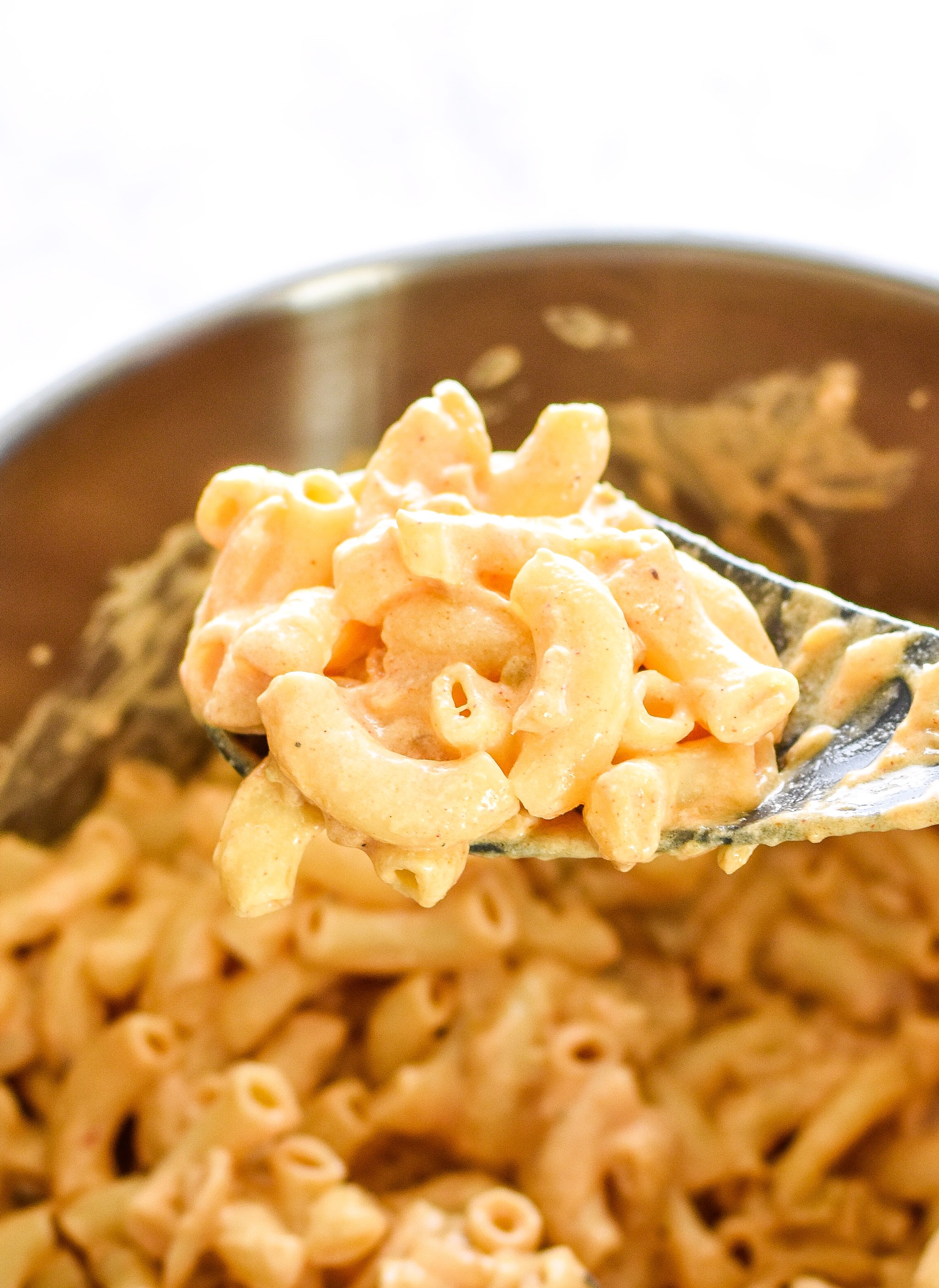 A big spoonful of smoky white cheddar camping mac and cheese.