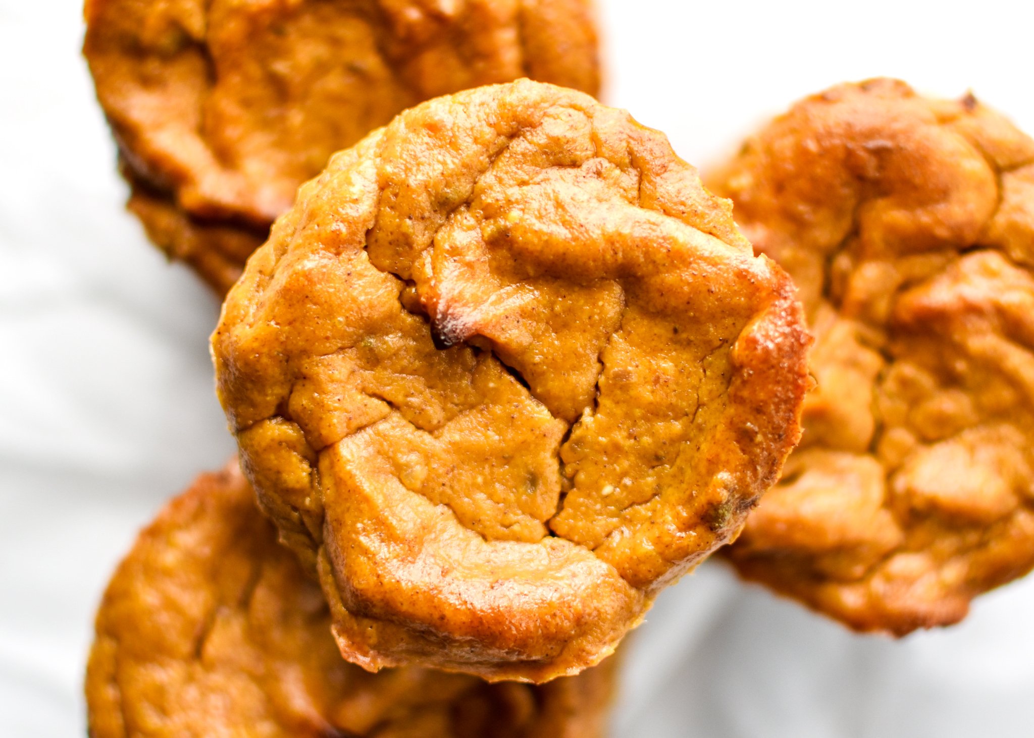 Fruit-Sweetened Mini Pumpkin Pies - Super adorable, creamy and delicious, not to mention both the crust and filling have no sugar added! Try this classic dessert in an easy to hold, pop-in-your-mouth version! - ProjectMealPlan.com