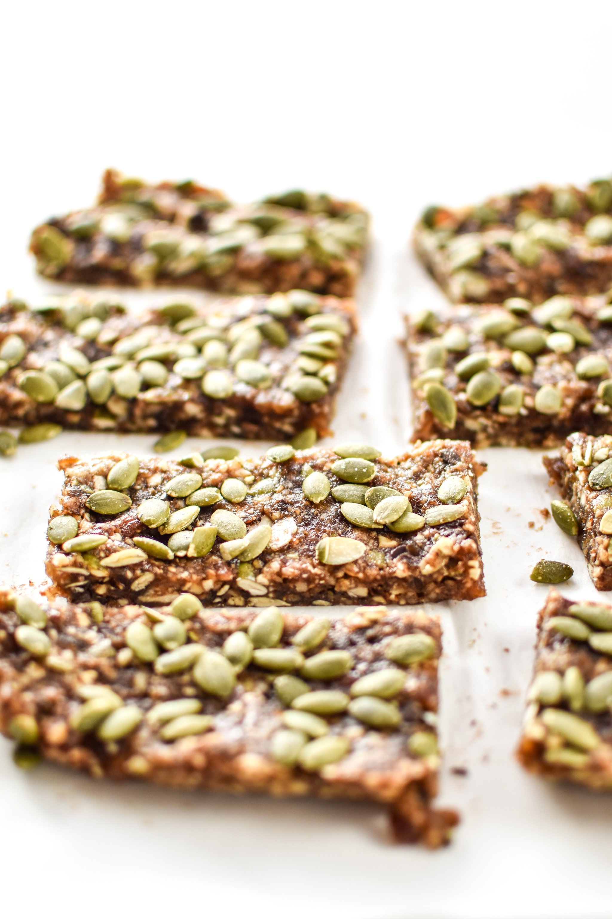 No-Bake Pumpkin Spice Date Nut Bars cut and ready to eat