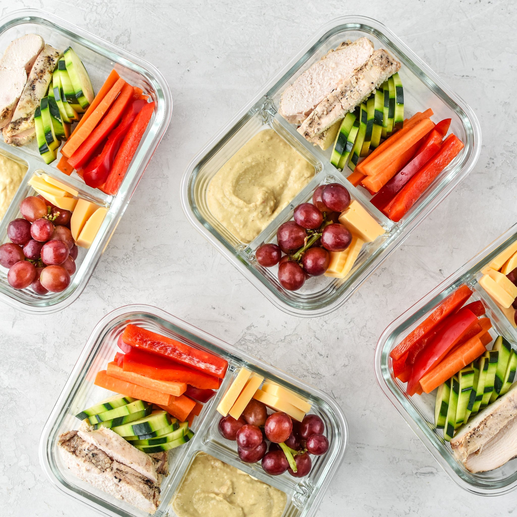 Four Chicken & Hummus Plate Lunch Meal Prep meals ready to be eaten!