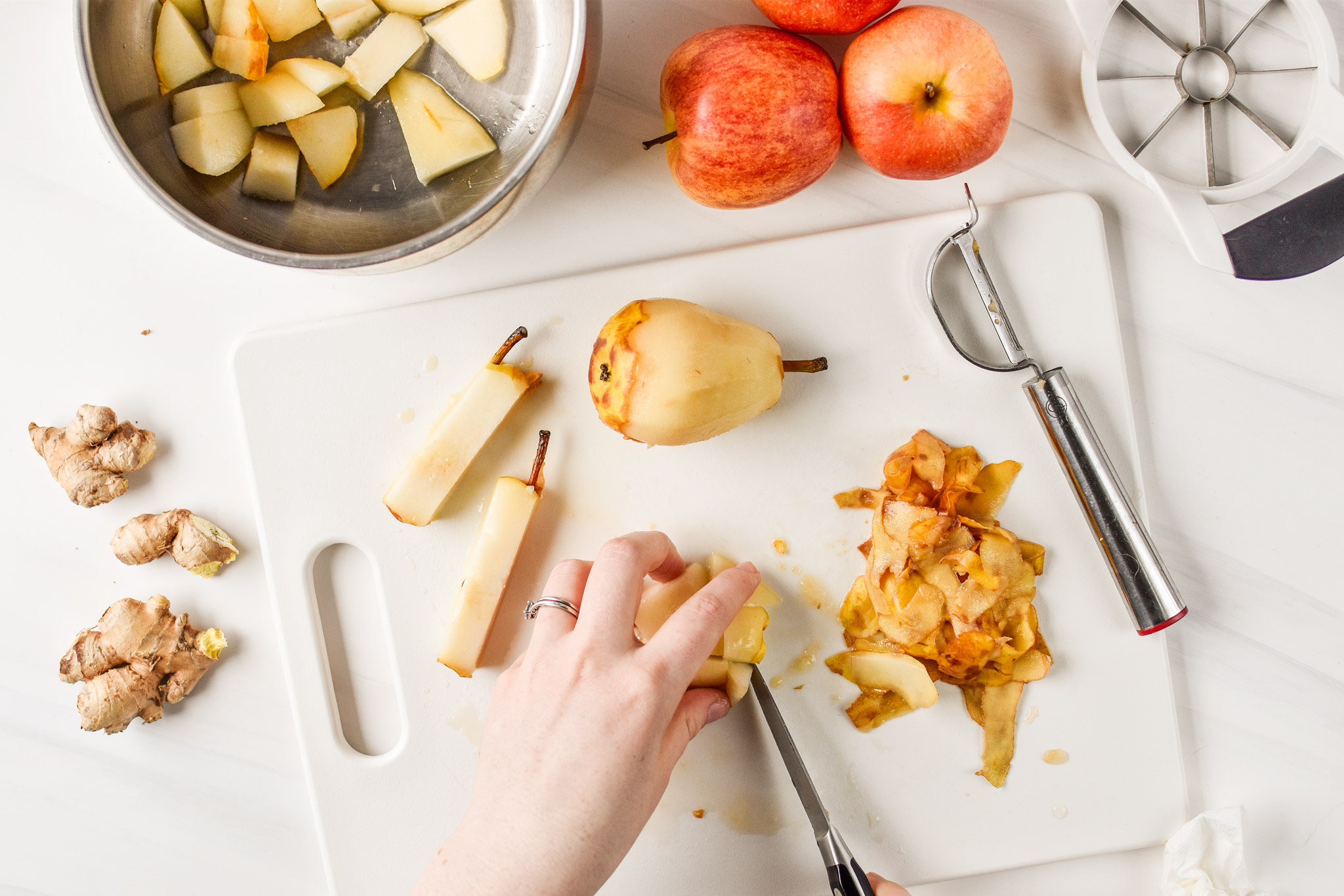 Cutting pears for the Ginger Pear Cinnamon Applesauce