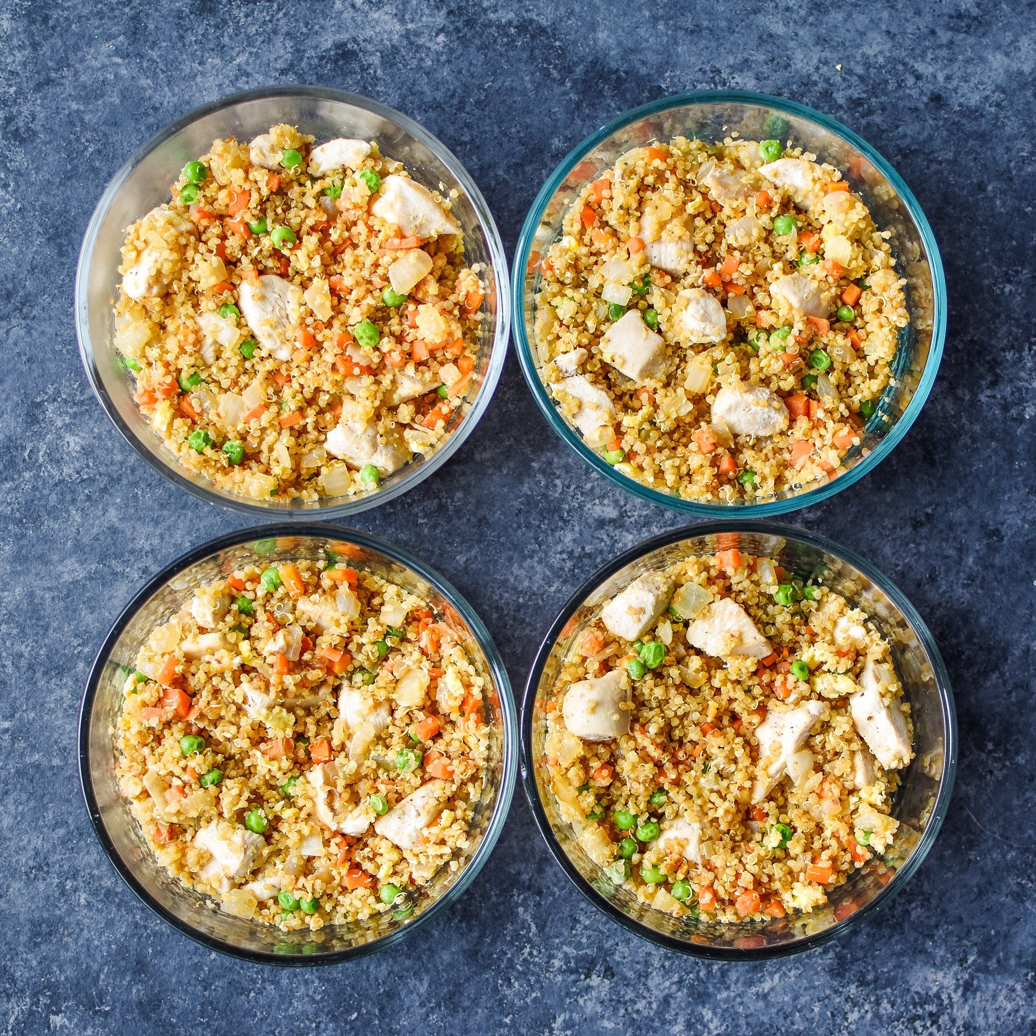 Quinoa fried rice in round pyrex bowls. Meal Prep Lunch Recipes