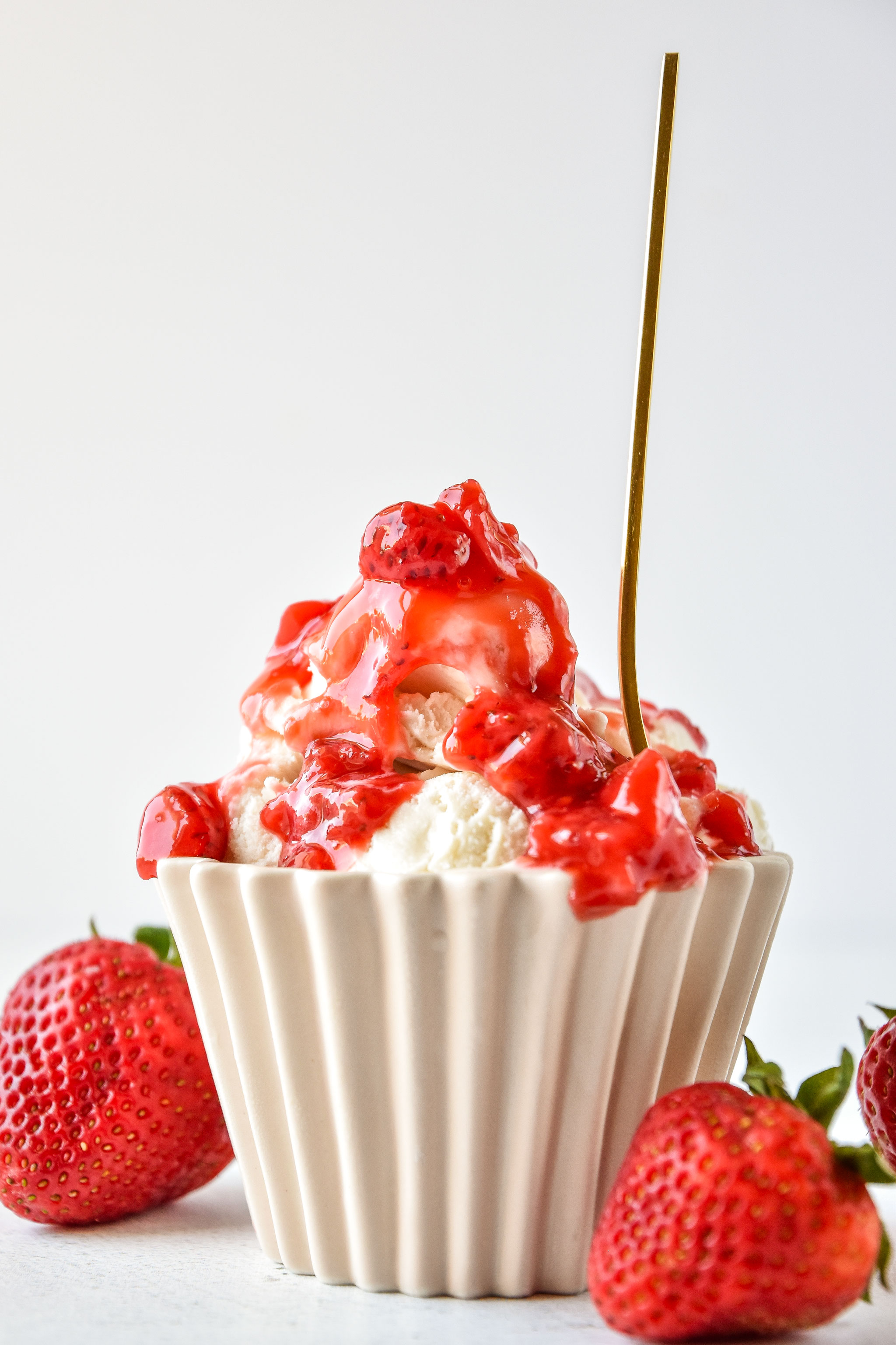 vanilla ice cream smothered in easy strawberry sauce