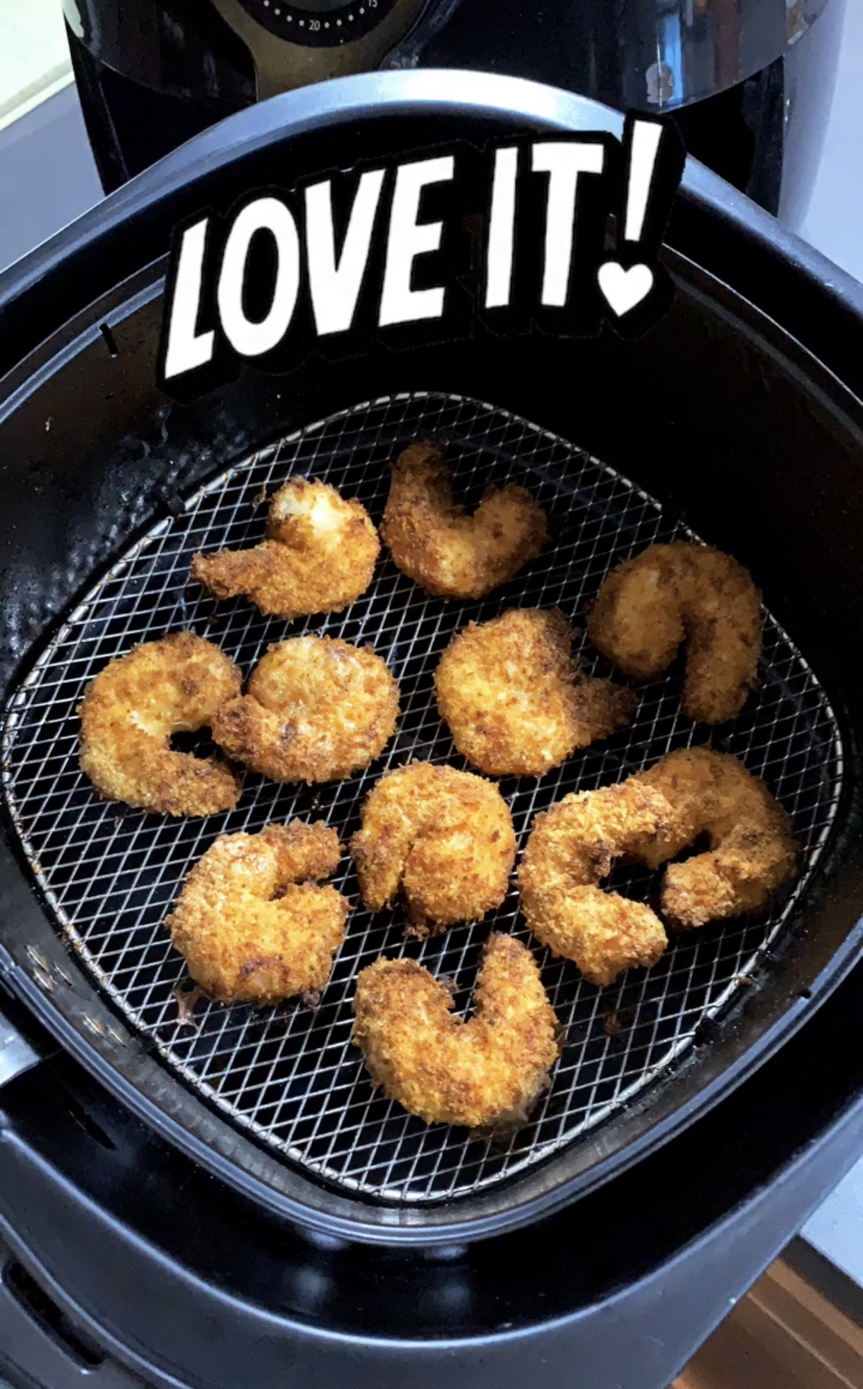 crispy shrimp in the air fryer basket 