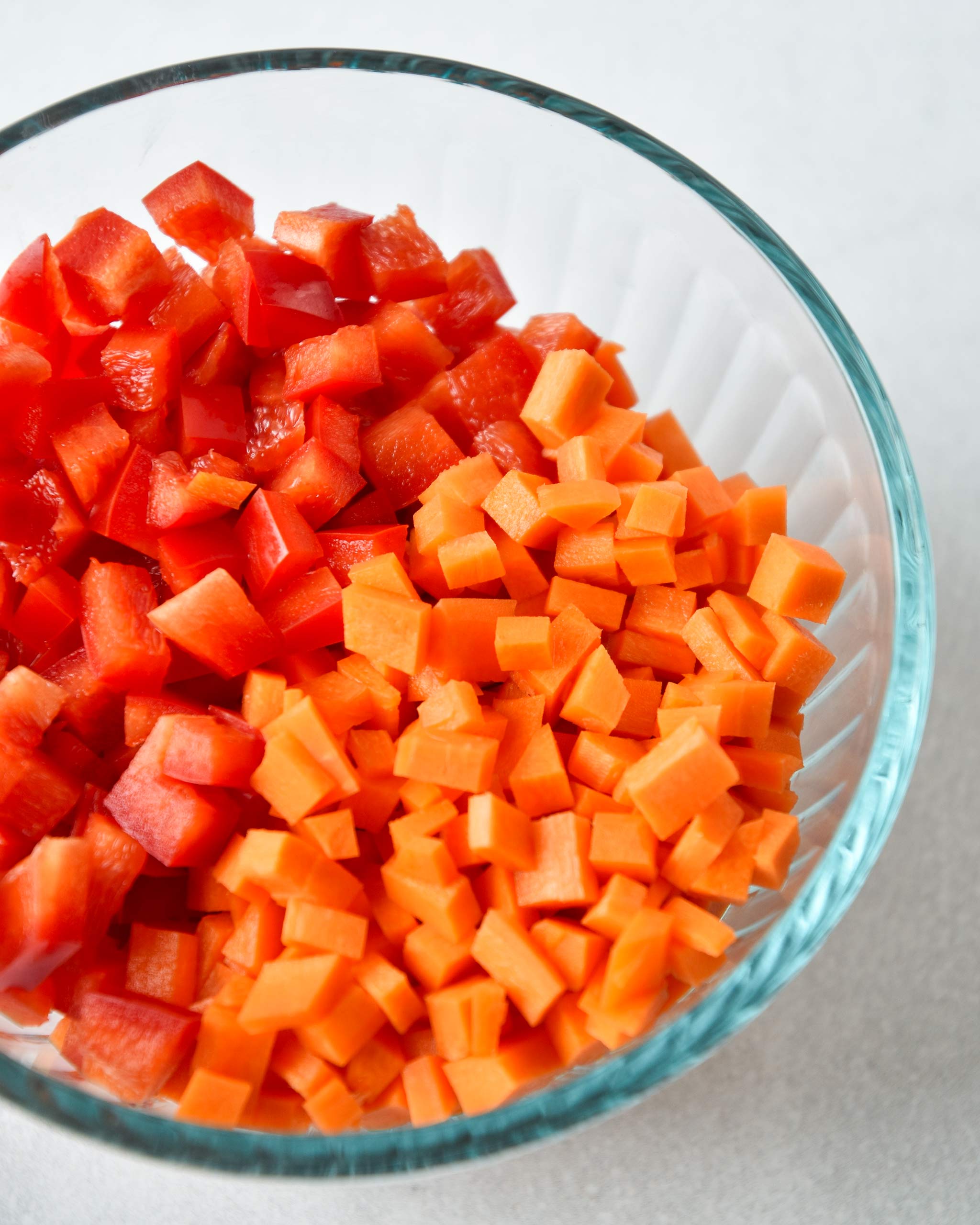 red bell peppers and carrots chopped up for the recipe
