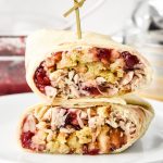 Turkey Gobbler Wrap cut in half on a plate