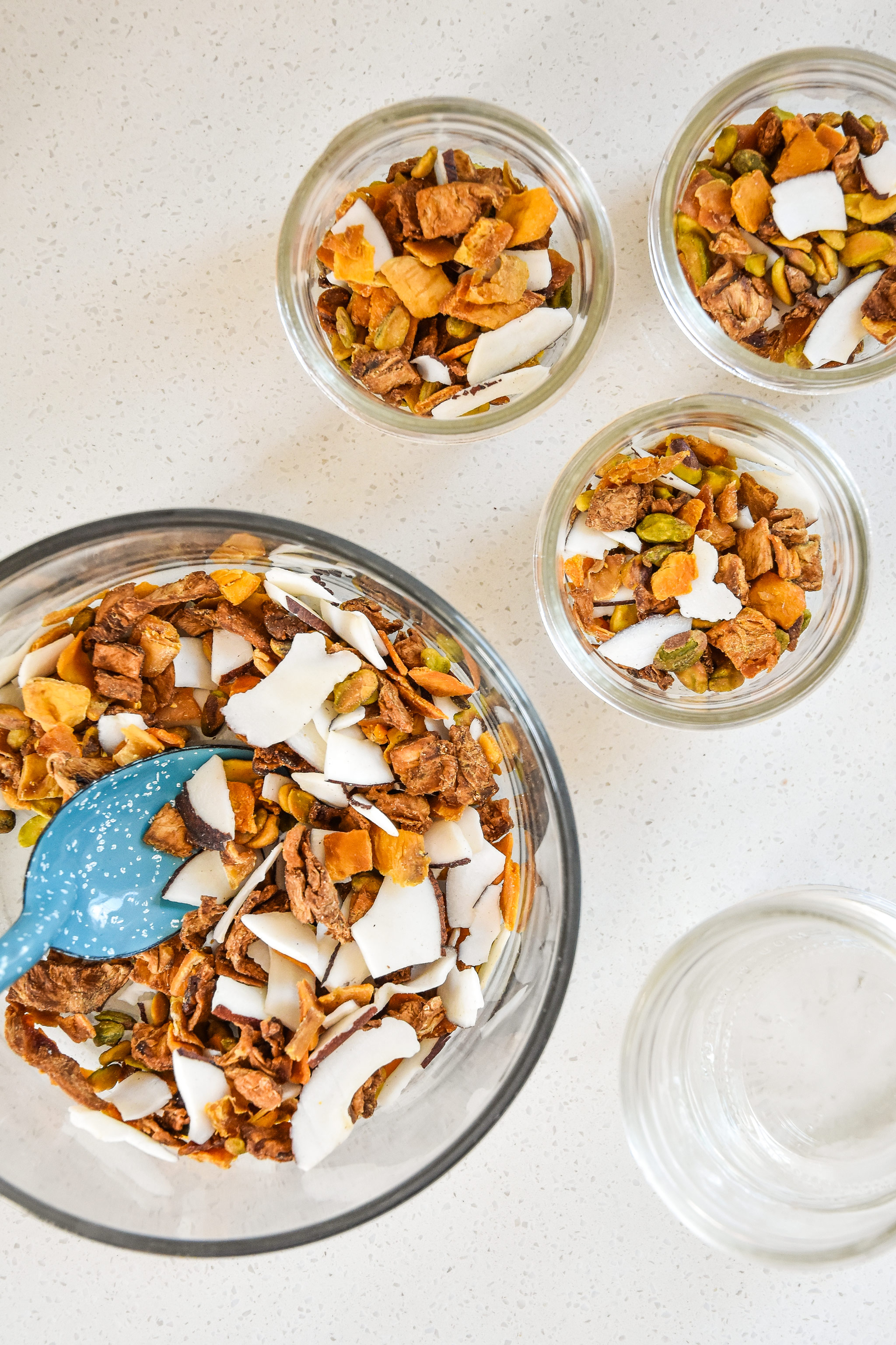 portioning out the tropical dried fruit trail mix
