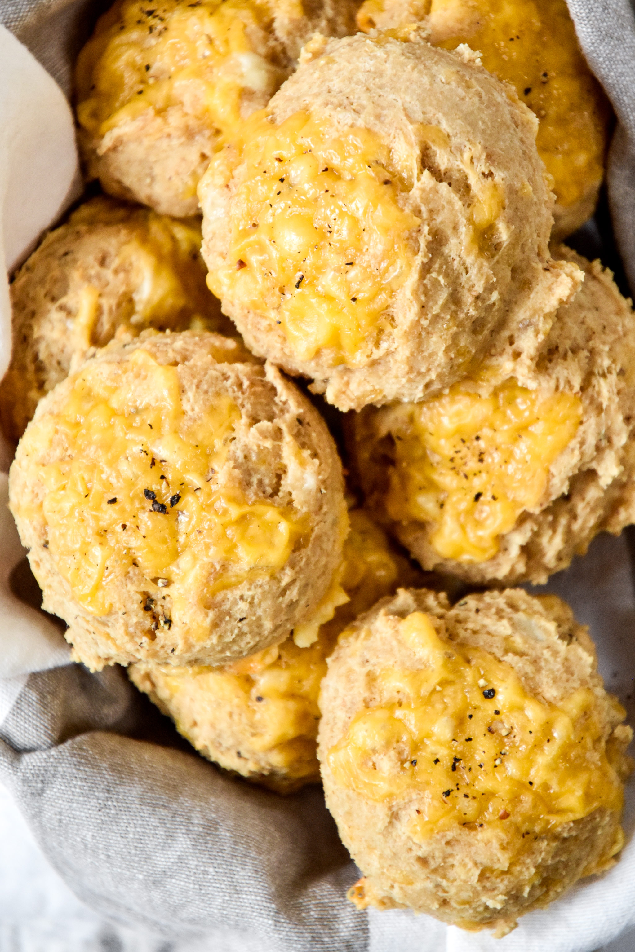 pancake mix cheddar drop biscuits in a basket.