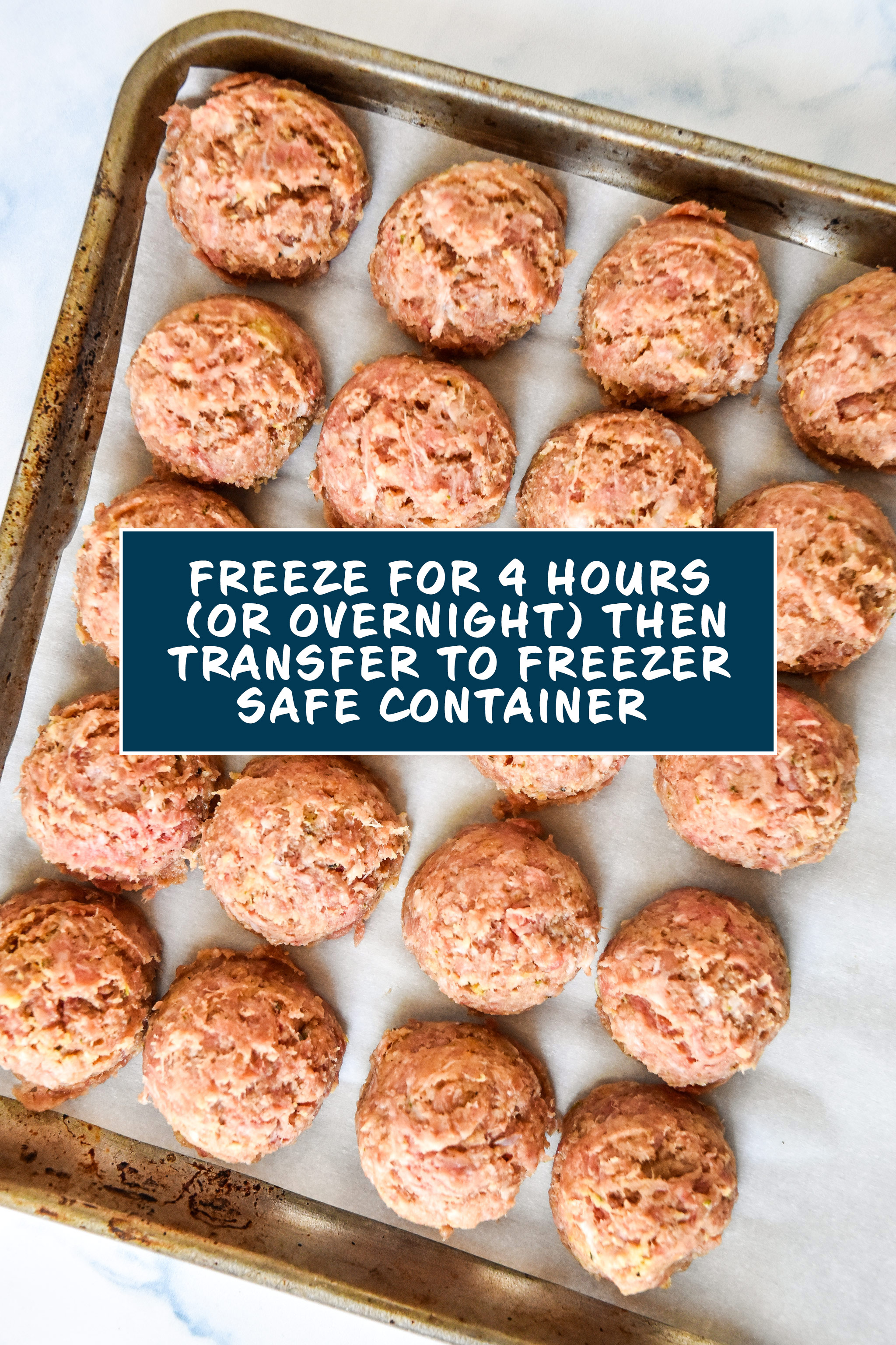 easy freezer friendly meatballs on a sheet pan frozen overnight.