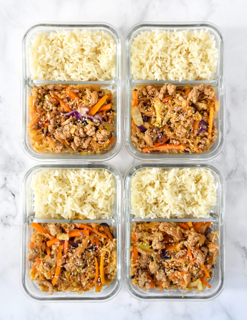 This Spicy Ground Turkey & Cabbage Stir Fry Meal Prep is a flavorful mix of ground turkey, ginger, garlic, chili sauce, fresh cabbage, and carrots. Served over your favorite kind of rice for the one of the easiest meal preps ever!