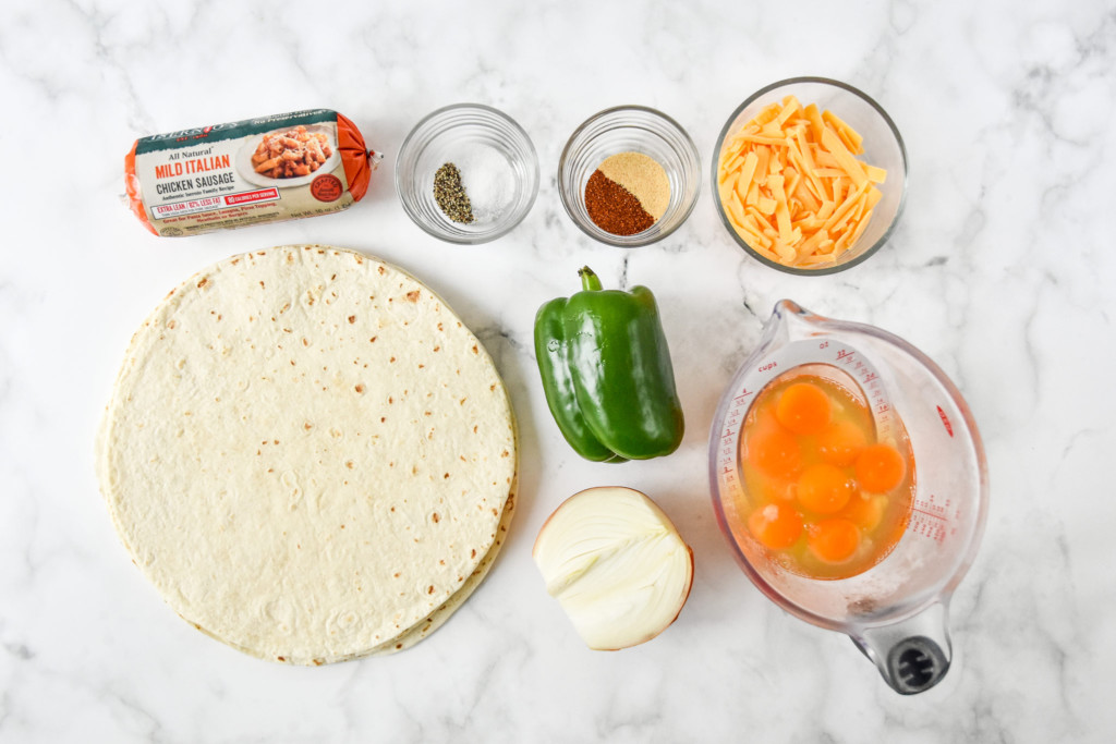 ingredients laid out for the freezer friendly breakfast burritos before cooking.