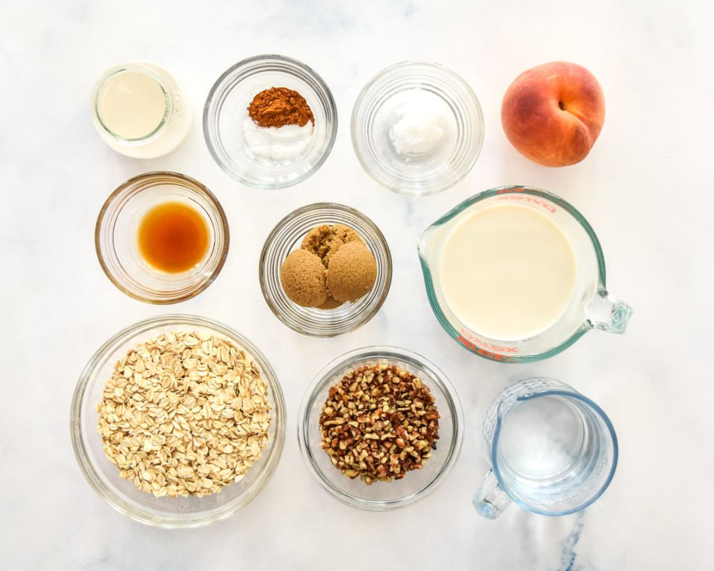 ingredients needed to make the peaches and cream oatmeal with rolled oats and fresh peaches.