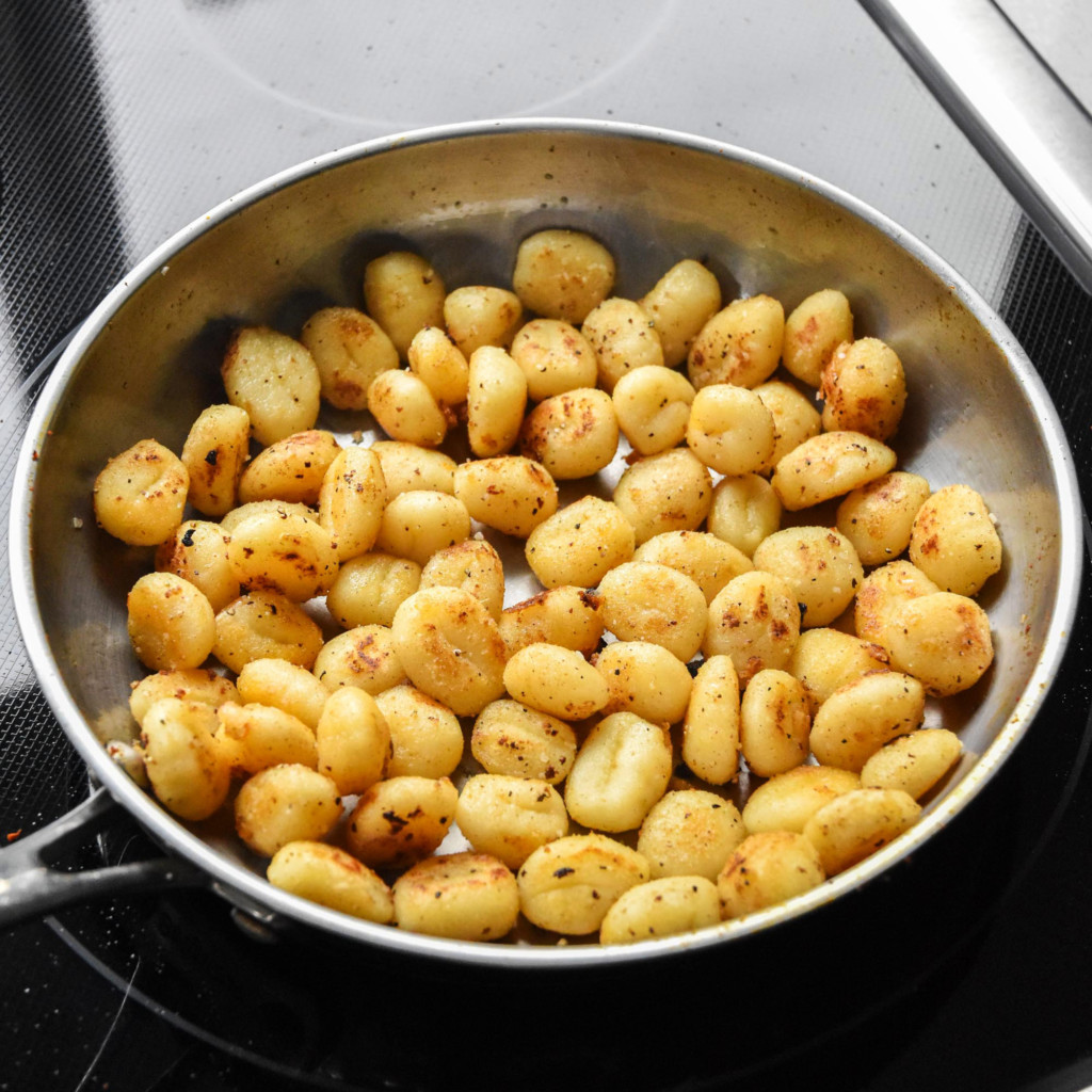 cooking gnocchi in a pan for the one-pan soy chorizo gnocchi skillet.