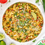 pan roasted corn pasta salad with lime in a serving bowl.