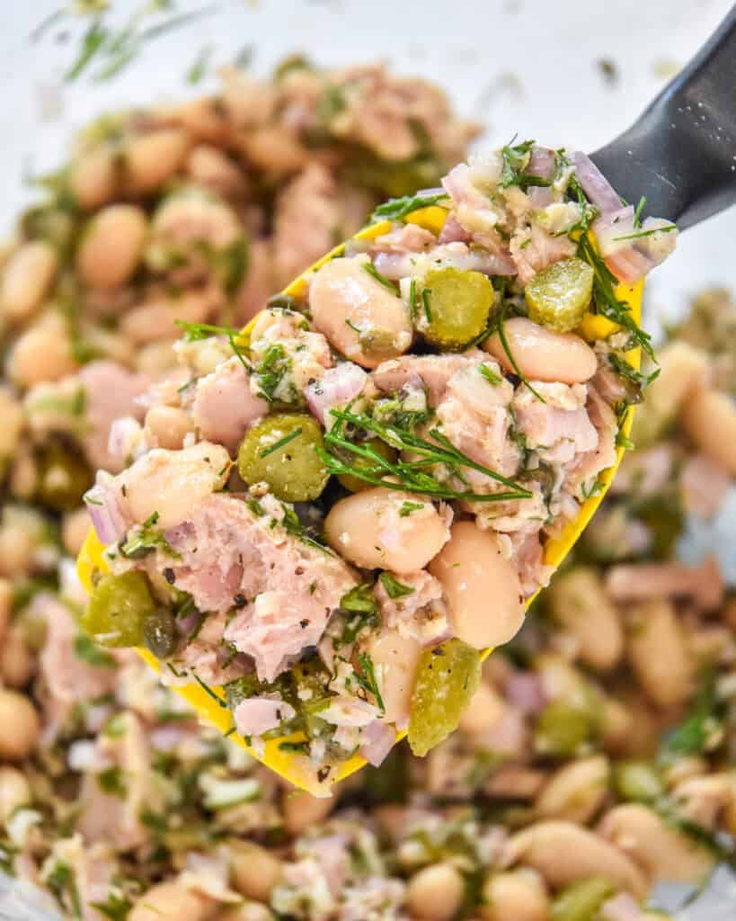 a spoonful of french-style tuna white bean salad.